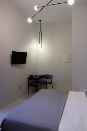 Postel nebo postele na pokoji v ubytování Luciani 33 luxury rooms