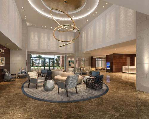 a lobby with a chandelier in a hotel at The Reef at Atlantis in Nassau