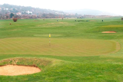 a view of a golf course with a green at Hythe Imperial Hotel, Spa & Golf in Hythe