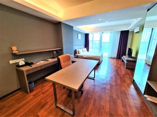Χώρος καθιστικού στο Nexus Regency Suites & Hotel