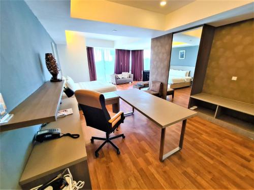Μια τηλεόραση ή/και κέντρο ψυχαγωγίας στο Nexus Business Suite Hotel