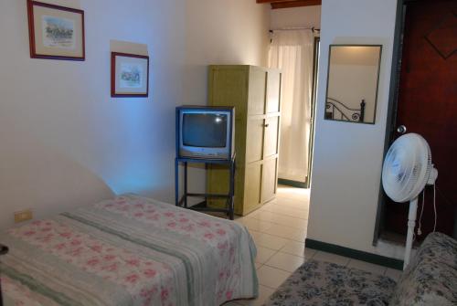Postel nebo postele na pokoji v ubytování Hotel Tiumara Cartago