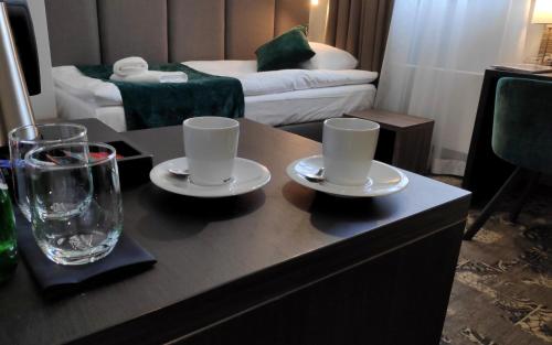 Ένα ή περισσότερα κρεβάτια σε δωμάτιο στο Hotel Estera