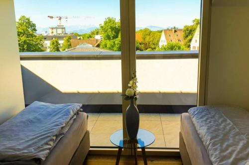 Postel nebo postele na pokoji v ubytování Penthouse 37th HEAVEN (ca. 90m²)