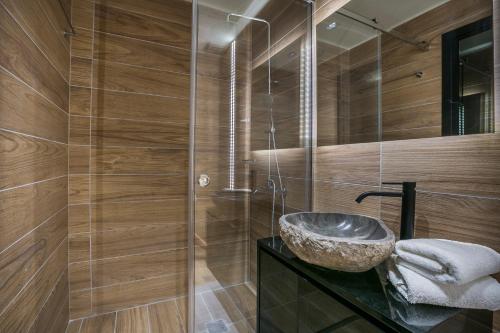 Ванная комната в Oikos Boutique Residences