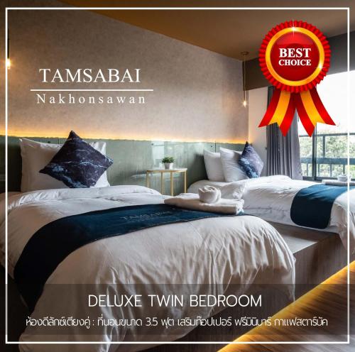 Ένα ή περισσότερα κρεβάτια σε δωμάτιο στο Tamsabai hotel
