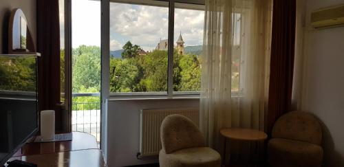 Svetainės erdvė apgyvendinimo įstaigoje GRAND HOTEL CEAHLAU