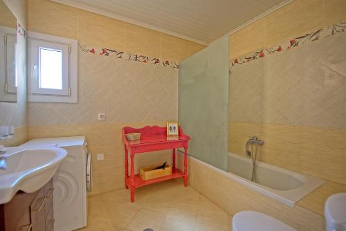 A bathroom at Beach Villa Joanna by PosarelliVillas