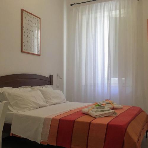 Letto o letti in una camera di YooRoom