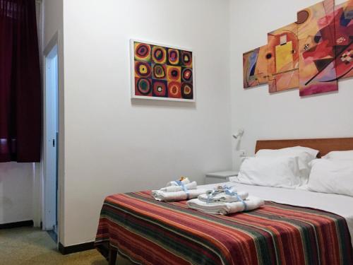 A bed or beds in a room at YooRoom