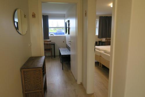 Postel nebo postele na pokoji v ubytování Dilksnes Guesthouse