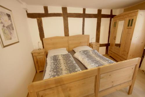 a bedroom with two beds in a room at Historisch übernachten Brinkerplatz 3 in Essen
