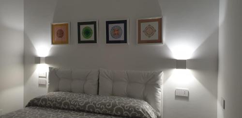 Postel nebo postele na pokoji v ubytování Sorrento Mandala Home