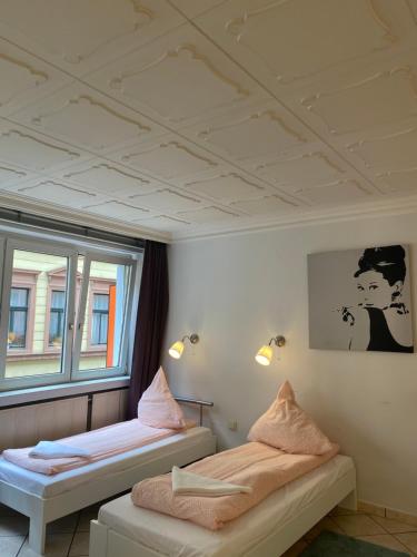 Кровать или кровати в номере Central Shared Apartment, Friesenplatz