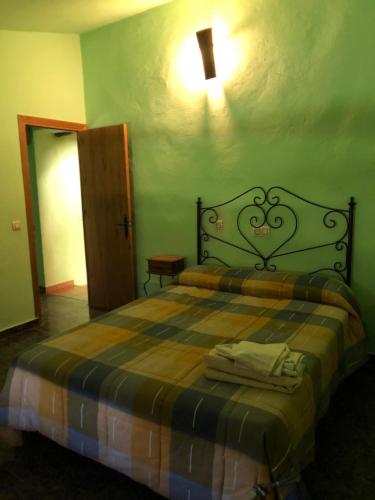 Un ou plusieurs lits dans un hébergement de l'établissement Casas Rurales Arroyo de la Sierra