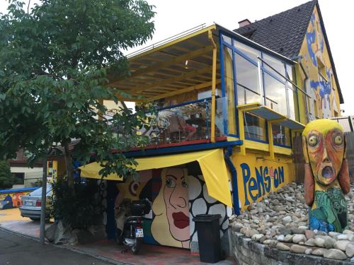 a play house with a painting on the side of it at Pension Weinsberg in Weinsberg