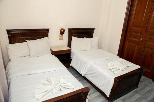 Кровать или кровати в номере My Hotel