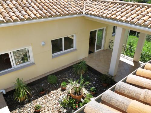 an aerial view of a house with plants at Luz de Azahar Bed and Breakfast in Peñíscola