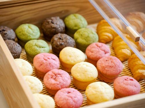 a drawer filled with different types of donuts at Best Western Hotel Fino Tokyo Akasaka in Tokyo