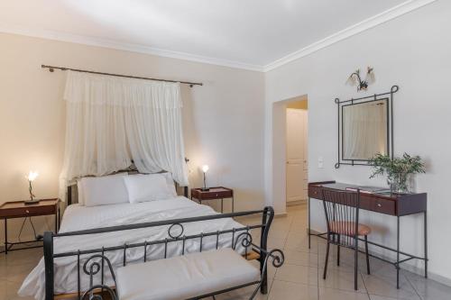 Postel nebo postele na pokoji v ubytování Epavlis Hotel & Spa