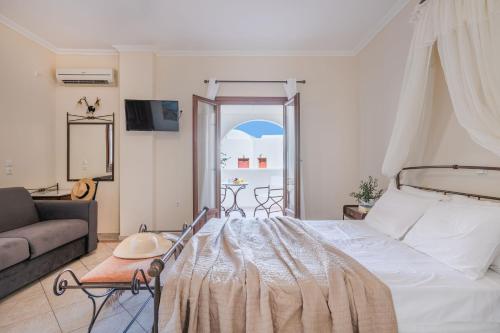 Postel nebo postele na pokoji v ubytování Epavlis Hotel & Spa
