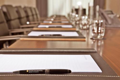a pen sitting on top of a long table at InterContinental Cascais-Estoril by IHG in Estoril