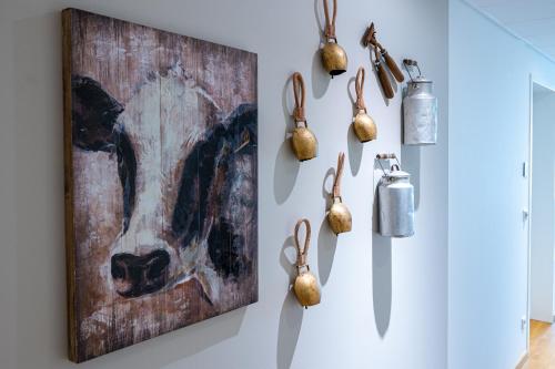 a painting of a dog on a wall at Hotel Stadt Freiburg in Freiburg im Breisgau
