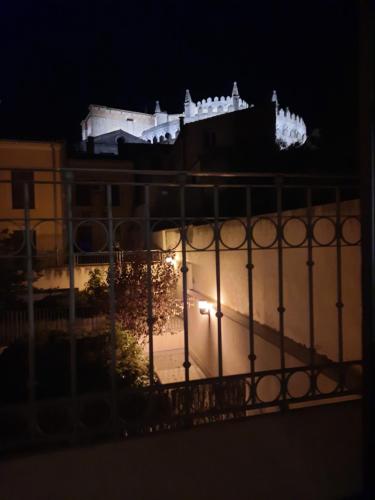 a view of a castle at night at estrada15 in Avila