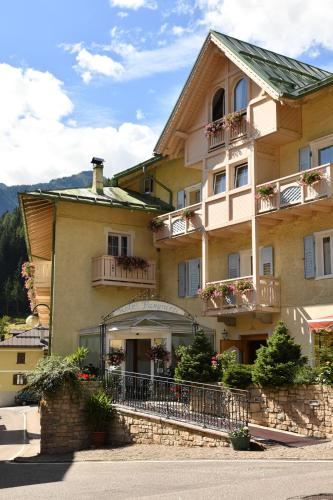 a large building with balconies on the side of it at Hotel Pangrazzi - 3 stelle superior in Fucine