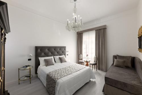 מיטה או מיטות בחדר ב-Hotel Berna
