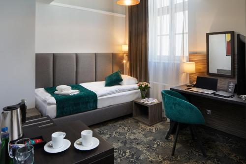 Ένα ή περισσότερα κρεβάτια σε δωμάτιο στο Hotel Estera