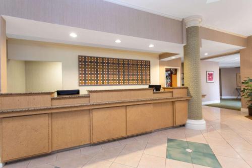 a waiting area of a hospital with a waiting room at La Quinta by Wyndham Jacksonville Butler Blvd in Jacksonville