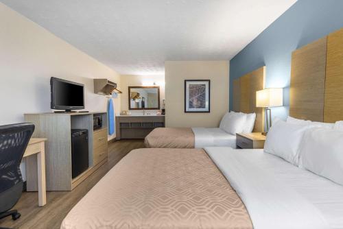Econo Lodge Middlesboroにあるベッド