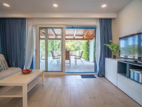 TV a/nebo společenská místnost v ubytování Holiday Home Natali by Interhome