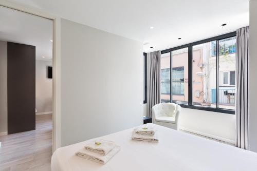 Postel nebo postele na pokoji v ubytování Sitges Vibe Apartments by Olala Homes