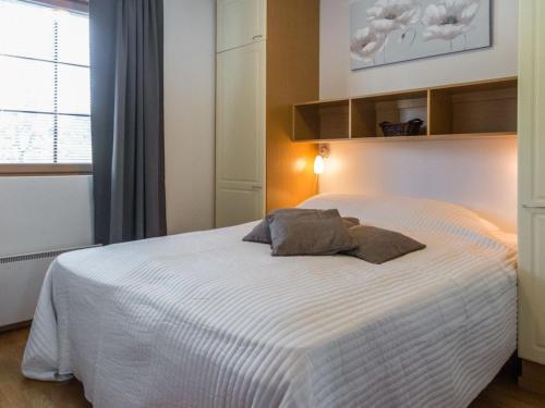 En eller flere senge i et værelse på Holiday Home Tahko 4seasons 2 by Interhome