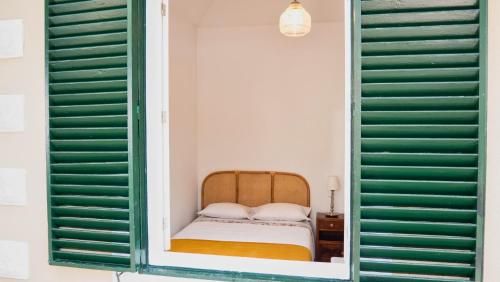 Posteľ alebo postele v izbe v ubytovaní Casa da Bungavillia