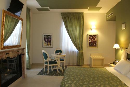 Ein Bett oder Betten in einem Zimmer der Unterkunft Hotel Capovilla