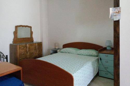 Säng eller sängar i ett rum på Appartamento in campagna a Sciacca