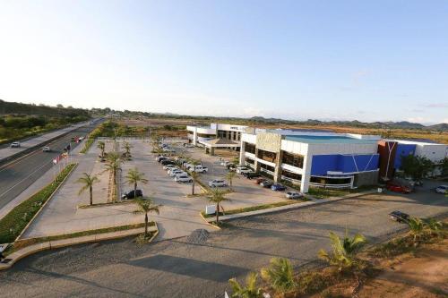 an aerial view of a parking lot next to a highway at Hotel Mykonos in Santiago