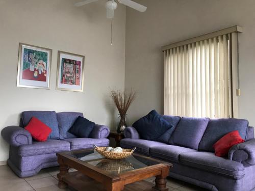 Zona de estar de MS Suite Amueblada Alberca Blvd B Quintana