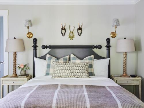 A bed or beds in a room at The White Barn Inn & Spa, Auberge Resorts Collection