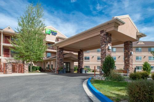 a rendering of a hotel with a parking lot at Holiday Inn Express Hotel & Suites Gunnison by IHG in Gunnison