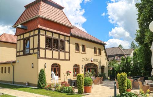 a building with a turret on the side of it at Haus Birgit A in Kuhlen