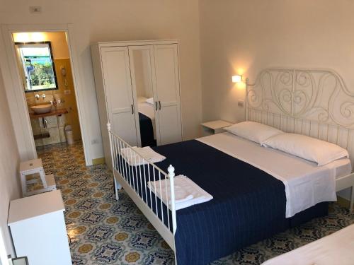 Ένα ή περισσότερα κρεβάτια σε δωμάτιο στο Rena Resort