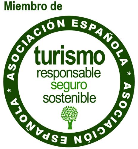 a green circle with the words migration agency and a tree in the middle at El Arcon in Simancas