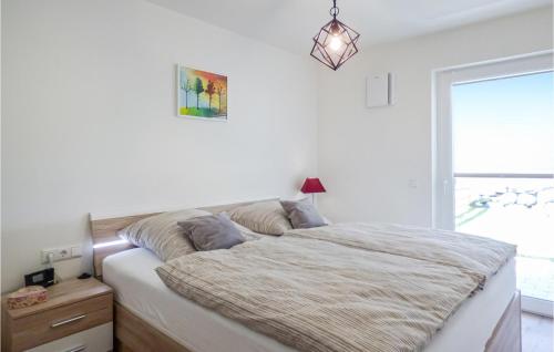 מיטה או מיטות בחדר ב-Nice Apartment In Pfronten With Wifi