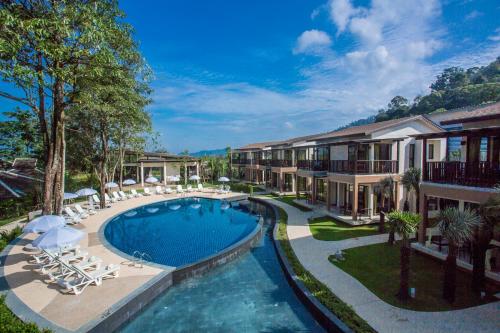 an image of a swimming pool at a resort at The Leaf on The Sands by Katathani - SHA Extra Plus in Khao Lak