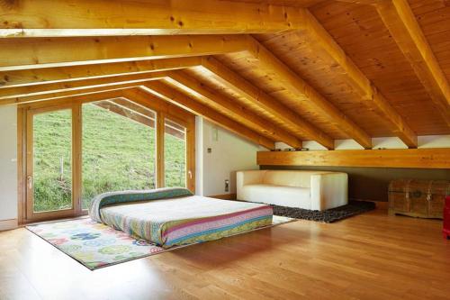 Llit o llits en una habitació de Casa rural a 10 minutos de San Sebastian
