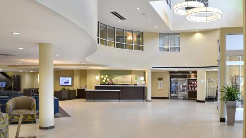 a lobby of a hospital with a waiting room at Holiday Inn Canton-Belden Village by IHG in Canton